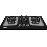 Black gas stove with three burners on a white background