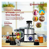 Westpoint food processor machine with various attachments and a glass of juice, showcasing the machine's capabilities for making a variety of foods.