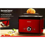 Silver Crest multifunction bread toaster in red color with a loaf of bread on the top, and a basket of food with the brand name around it.